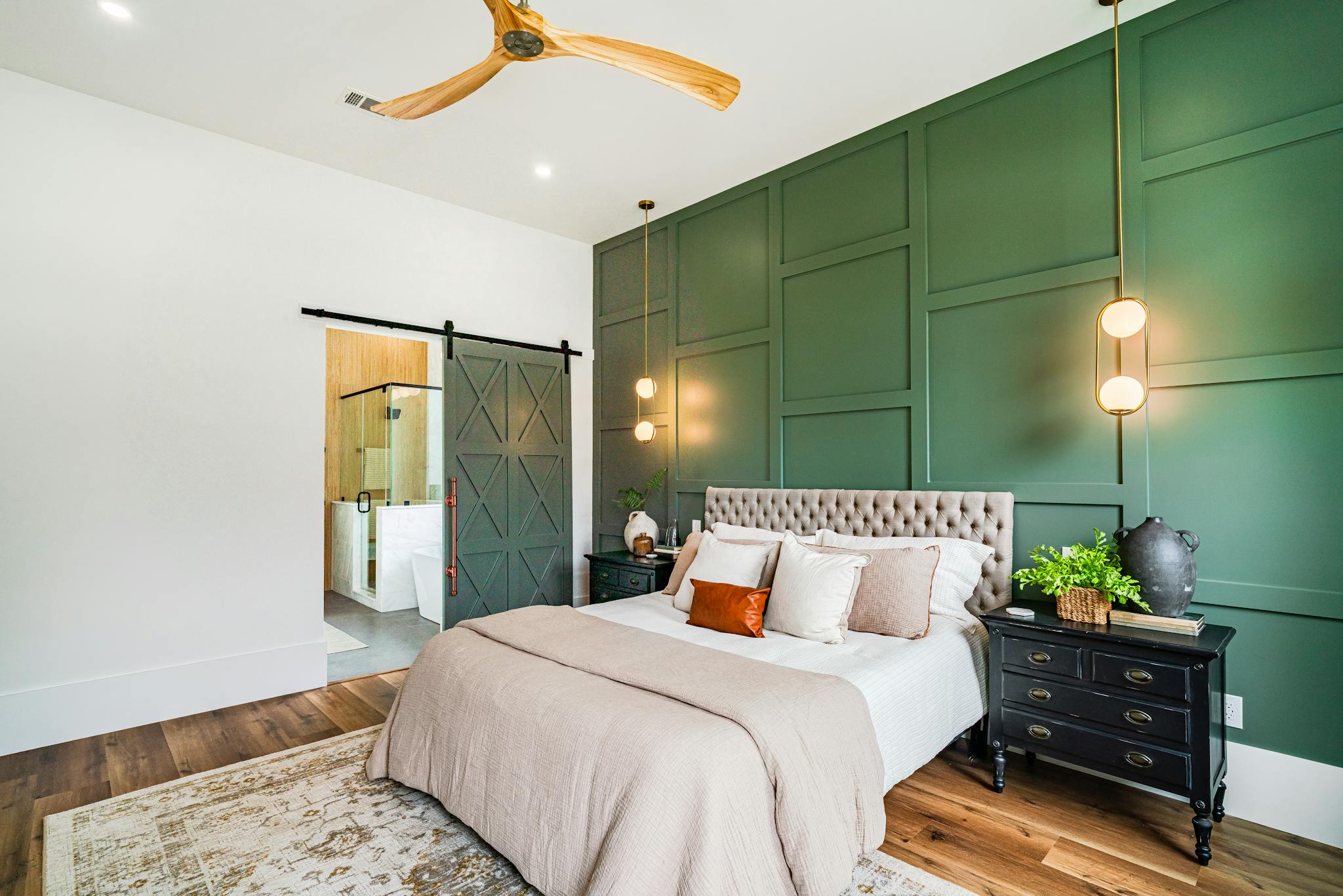 Chic bedroom in New Orleans featuring modern decor and luxury furniture.